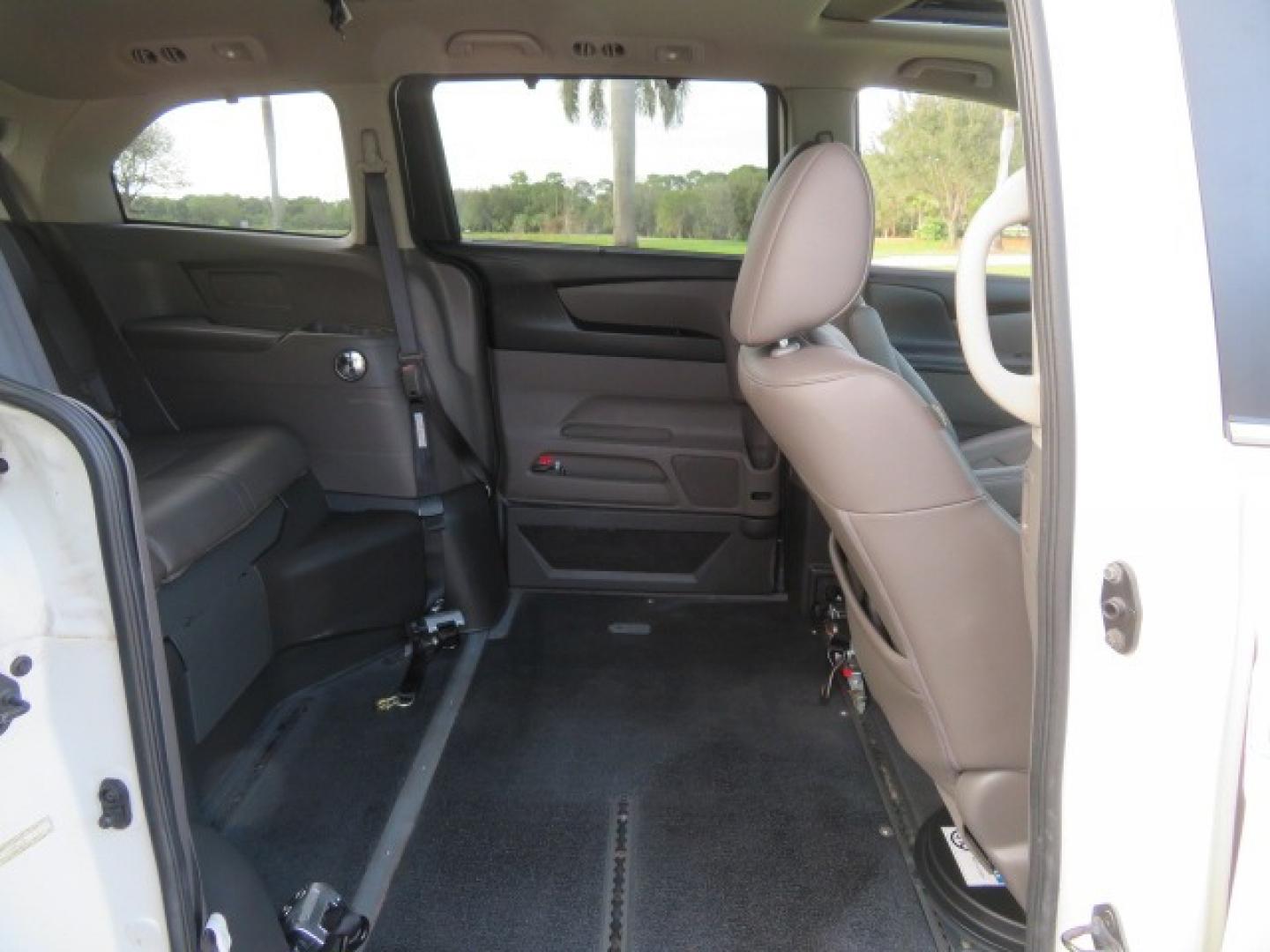 2016 White /Truffle Honda Odyssey (5FNRL5H63GB) , Automatic transmission, located at 4301 Oak Circle #19, Boca Raton, FL, 33431, (954) 561-2499, 26.388861, -80.084038 - You are looking at Gorgeous Pearl White Diamond 2016 Honda Odyssey EX-L VMI Northstar Handicap Wheelchair Conversion Van with 79K Original Miles, In-Floor Power Side Entry Ramp with Kneeling Van Function, Passenger Side 6 Way Transfer Seat, Quick Release Driver's Seat, Hand Controls, Tie Down System - Photo#53